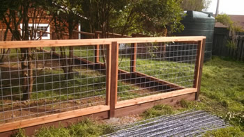 hog wire redwood fence